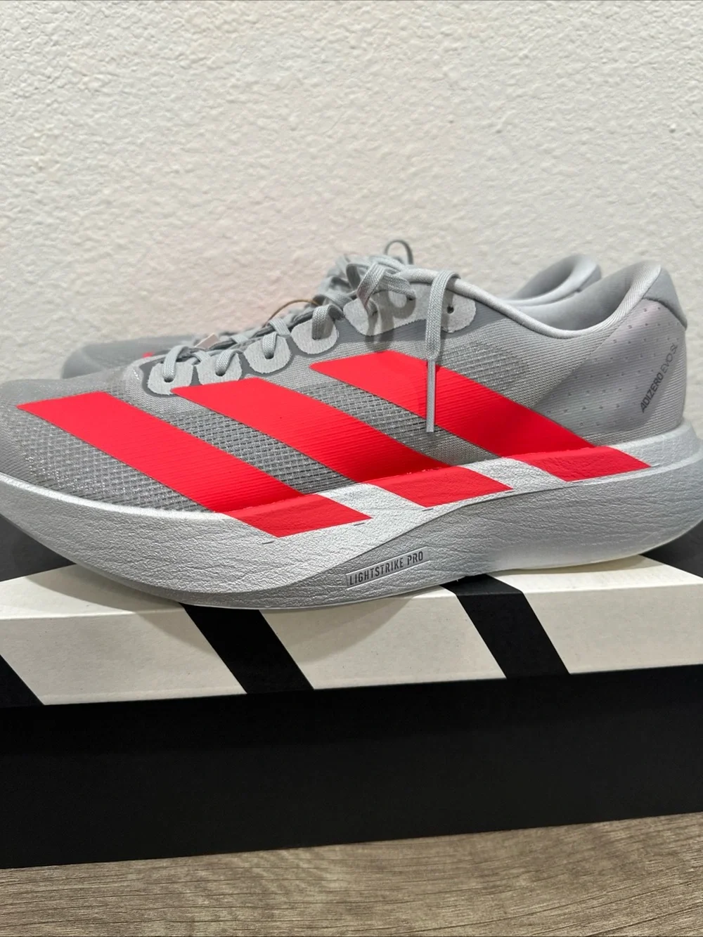 adidas Men’s Gray Athletic Shoes with Red Stripes